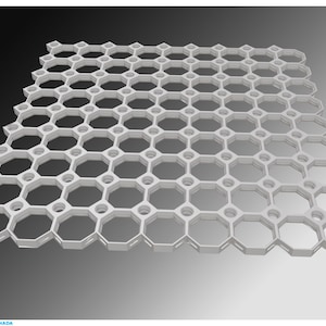 May include: A white plastic grid with a honeycomb pattern. The grid features a repeating design of interconnected octagonal cells. This product is likely used for ground stabilization or drainage, with each cell measuring approximately 10 cm.