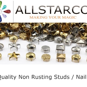 May include: An assortment of non-rusting studs and nailheads in gold and silver tones. Various shapes include stars, squares, and round designs. The image includes the text "ALLSTARCO MAKING YOUR MAGIC" and "High Quality Non Rusting Studs / Nailheads".