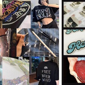 May include: A collage of images showcasing embellished apparel and accessories. Featured items include a black t-shirt with "MIDAY" and angel design, a denim jacket with rhinestone detailing, and a black face mask with rhinestones. Other items include a rhinestone-covered heart-shaped clutch.