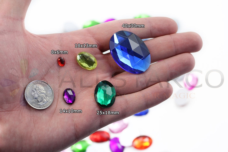 Flat Back Oval Acrylic Rhinestones Plastic Gems on hand next to quarter 25 cents usa crystal clear jewels size reference allstarco For Crafts Embellishments Card Invitations, Gemstones High Quality Premium Rhinestones for Garments Fashion Kid School