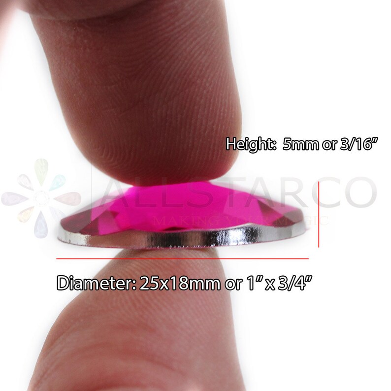 May include: A close-up of a bright pink, faceted, round, glass gem with a silver backing. The gem is 1 inch in diameter and 3/16 inch tall.  Height: 5mm or 3/16" Diameter: 25x18mm or 1"x3/4"