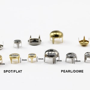 May include: Assortment of metal studs in various sizes and finishes. The image shows spot/flat and pearl/dome styles, with measurements in millimeters and inches. The studs are in gold, silver, and black finishes, with 3mm and 4mm legs.