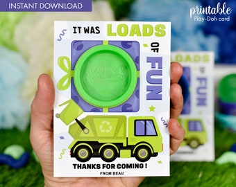 May include: A green and purple Play-Doh party favor card with a green truck and a Play-Doh container. The card says "It was loads of fun" and "Thanks for coming! From Beau".