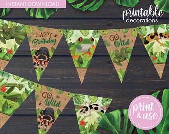 May include: Printable jungle-themed party banner with green leaves, a green frog, a spider, a snake, a gecko, and the text "Happy Birthday" and "Go Wild".