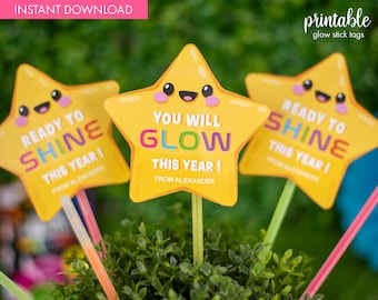 May include: Three yellow star-shaped glow stick tags with a smiley face and the text "Ready to Shine This Year!" and "You Will Glow This Year!" and "Ready to Shine This Year!"