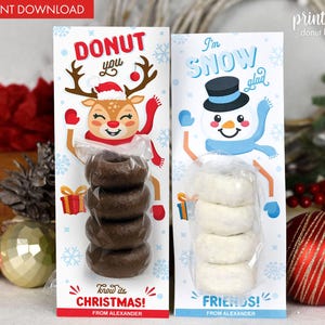 May include: Two printable donut holders with festive designs. One features a reindeer with the text "Donut you know it's Christmas!" and the other a snowman with "I'm snow glad friends!" Each holds four donuts.