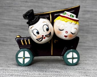 Relco Man Woman Salt & Pepper Shakers in Model T  Napkin Holder