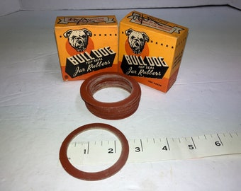 2 Antique Boxes of Bulldog Jar Rubbers