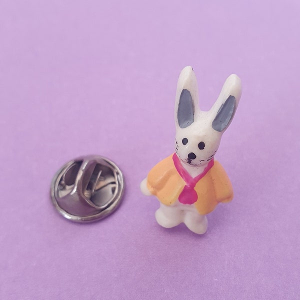 Vintage White rabbit pin badge yellow coat.
