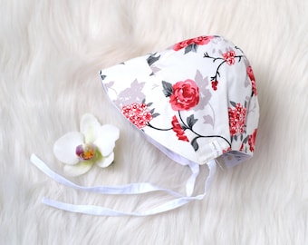 Reversible baby sun bonnet with red roses cotton and white cotton sides, newborn to toddler sizes ready to ship