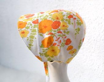 Reversible summer bonnet with orange flowers, sizes newborn to 5T, more color options