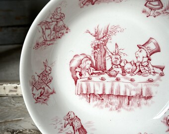 A rare Alice in Wonderland Johnson Bros. Red and white Ironstone transfer dish