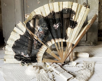 An antique hand painted silk fan for restoration