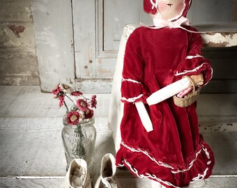 A wonderful Little Red Riding Hood antique peg doll