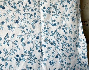 Vintage French light cotton fabric with blue ditsy flowers