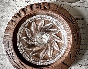 A vintage carved wooden butter tray with cut crystal glass dish.