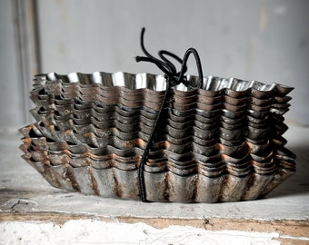 Fourteen vintage French patisserie baking tins