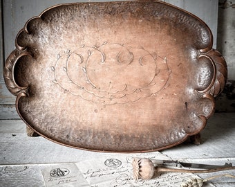 A beautiful antique carved bread tray or bread board.