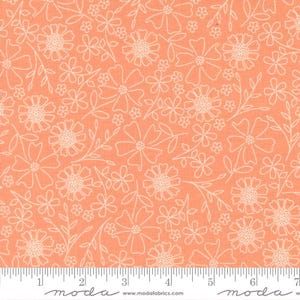 May include: A coral-colored fabric featuring a repeating pattern of white line-drawn flowers and thin stems. The textile is positioned above a white ruler that shows measurements in inches, with the text moda printed on the bottom edge.