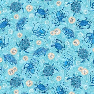 May include: A repeating pattern featuring blue sea turtles, octopuses, and crabs on a light blue background with swirling water effects. Beige sand dollars and bubbles are also scattered throughout the design.