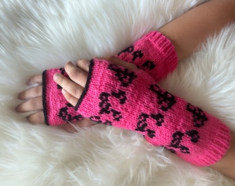 Knitted Arm Warmers: Pink Acrylic Wrist Cuffs with Music Notes
