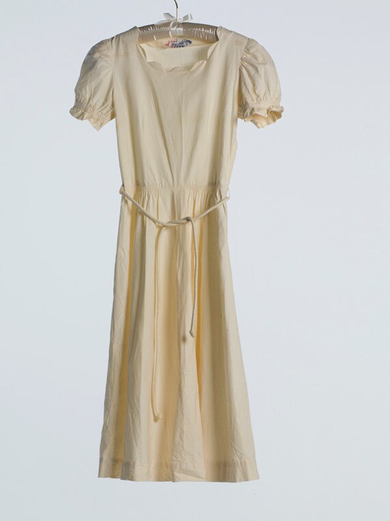 Ivory Cotton Dress with Smocking detail and belt