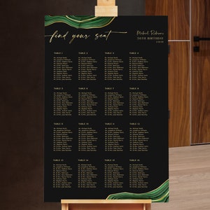 May include: A black and gold seating chart with a green and gold marble design. The chart is titled "find your seat" and lists tables and names for Michael Robinson's 50th birthday.