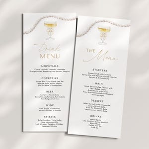 May include: Two printable wedding menu cards in a gold and white colour scheme. The cards feature a watercolour illustration of a champagne flute with a pearl necklace draped over the top. The left card has the title "Drink Menu" and lists mocktails, cocktails, beer, wine, and spirits. The right card has the title "The Menu" and lists starters, main courses, dessert, and drinks.