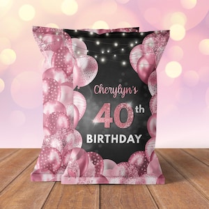May include: Pink and black chip bag with a rose gold glitter design. The bag features a black background with white lights, pink balloons, and the text "Cherylyn's 40th Birthday".