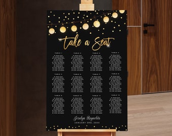 May include: Black seating chart with gold text and string lights. The words "take a seat" are in elegant script. The chart lists guest names under table numbers. The event is for Joselyn Reynolds on January 3rd, 20XX.