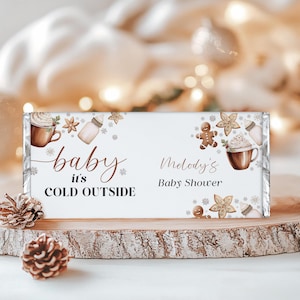 Modello modificabile per incarto di caramelle per baby shower con scritta "Fa freddo fuori" - Baby shower accogliente con fiocco di neve invernale - Scarica CP162BBS