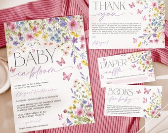 May include: A floral baby shower invitation with butterflies and the text "Baby in Bloom" and "Abigail Hutchinson". The invitation includes the date, time, and location of the shower. There are also cards for a diaper raffle and a book request for the baby.