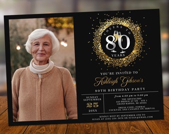 May include: Black and gold 80th birthday party invitation with a photo of a woman in a brown sweater. The invitation includes the text "Cheers to 80 Years" and details about the party, including the date, time, location, and dress code.