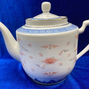 TIENSHAN Riceware Porcelain 32 Oz Chinese Teapot Rice Grains Pattern Blue and White Translucent Rice Eyes Design Orange Accents