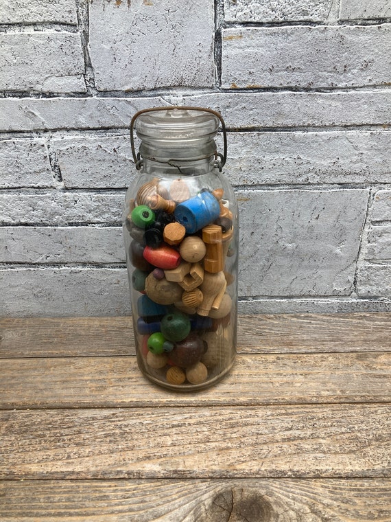 Large Mason Jar of Vintage Wooden Games Pieces and Beads Clear Glass Jar  With Baled Lock Multicolored Lot Craft Supplies Game Room Decor 