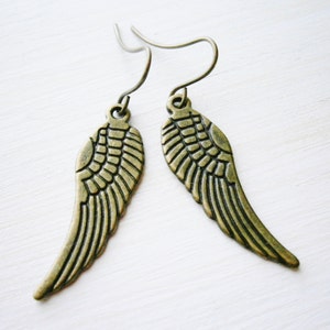 Angel Wing Antique Bronze Charm On Antique Bronze French Earring Hooks/Dangle Earrings.