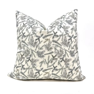 Evergreen branch pillow cover