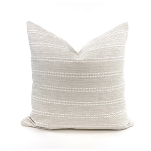 Cream and white woven stripe pillow cover