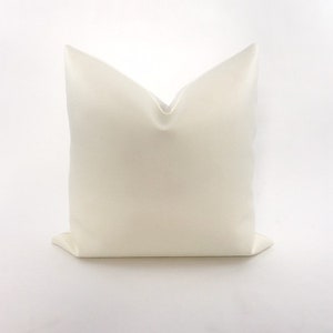 White faux leather pillow cover