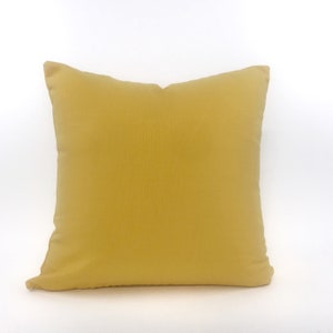 Bright yellow outdoor pillow cover