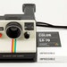 Victoria reviewed Vintage Polaroid OneStep SX-70 White Rainbow Stripe Instant Land Camera with 1 Pack of New Impossible Project Film - Tested & Working