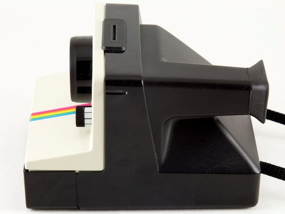 Polaroid　Camera　　SX-70　VINTAGE\r
alpha1 POLAROID SX-70, ORIGINAL MODEL, HAZY METER WINDOW, COSMETIC