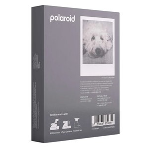 May include: A grey box with the Polaroid logo and a photo of a dog on the front. The back of the box has information about the product, including the text "600 film works with" and a list of compatible cameras. The box also has a barcode and the text "Polaroid Lab".
