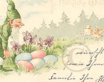 Cartolina originale vittoriana antica tedesca, litografia illustrata del 1902, gnomo nano con uovo e coniglio, cartolina pasquale tedesca
