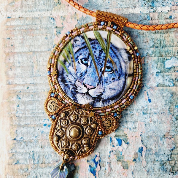 The blue Tiger necklace.