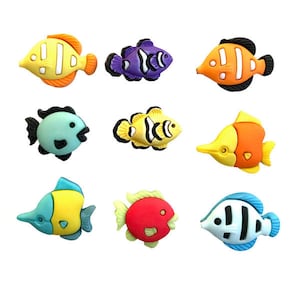 May include: Set of nine colorful plastic fish buttons. The buttons feature various fish designs, including a clownfish, a blue tang, and a pufferfish. The buttons are perfect for adding a touch of whimsy to crafts and sewing projects.