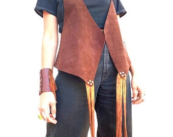 Fringe vest, brown leather vest and fringes.