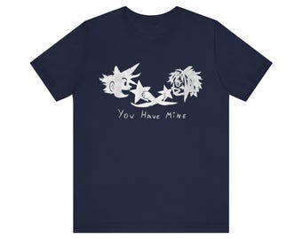May include: A navy blue short-sleeve t-shirt featuring a white graphic print of two stylized character heads facing each other while holding stars. Below the graphic, the text "YOU HAVE MINE" is printed in a simple, hand-drawn white font.