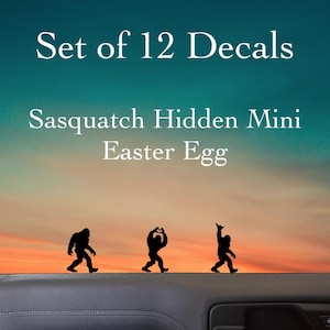 May include: Set of 12 decals featuring three black Sasquatch silhouettes against a sunset backdrop. The text reads "Sasquatch Hidden Mini Easter Egg". The decals are designed for Easter.