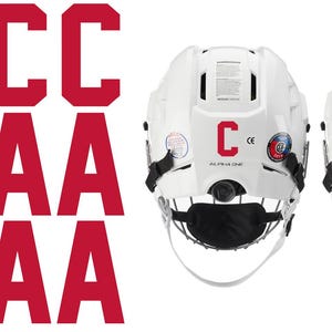 May include: White hockey helmets with black chin straps and red letter decals. The letters "C" and "A" are displayed on the back of the helmets. The image also shows multiple red "C" and "A" letter decals.